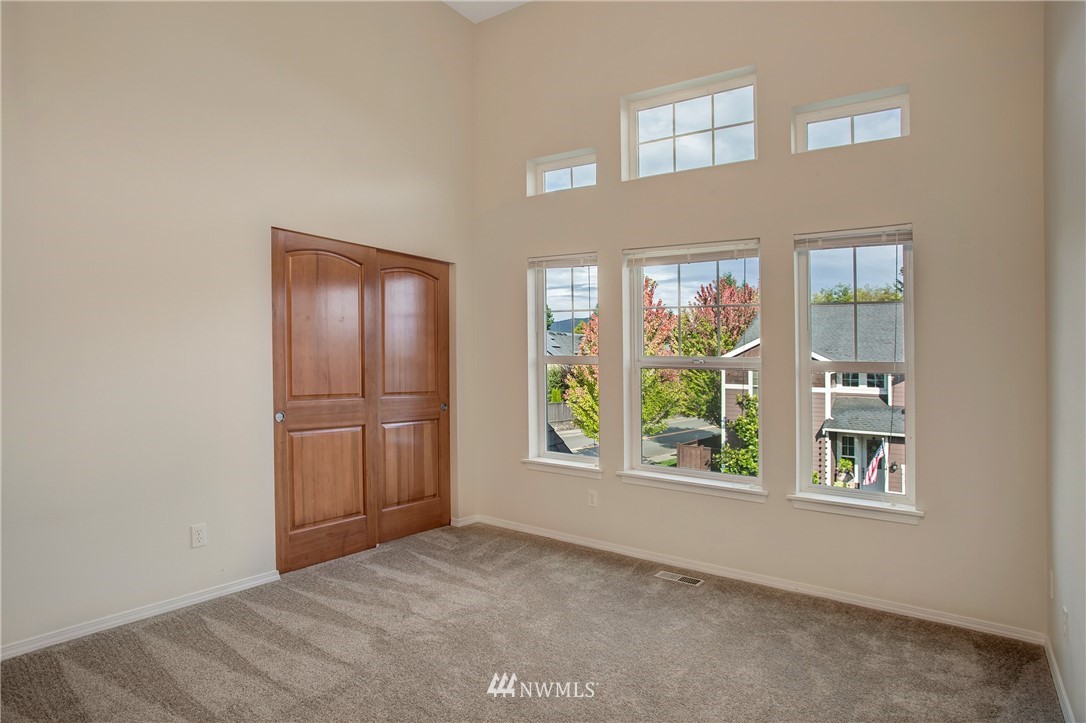 6709 Southeast 2nd Place Renton, WA 98059 - Photo 22 of 25 an empty room with windows