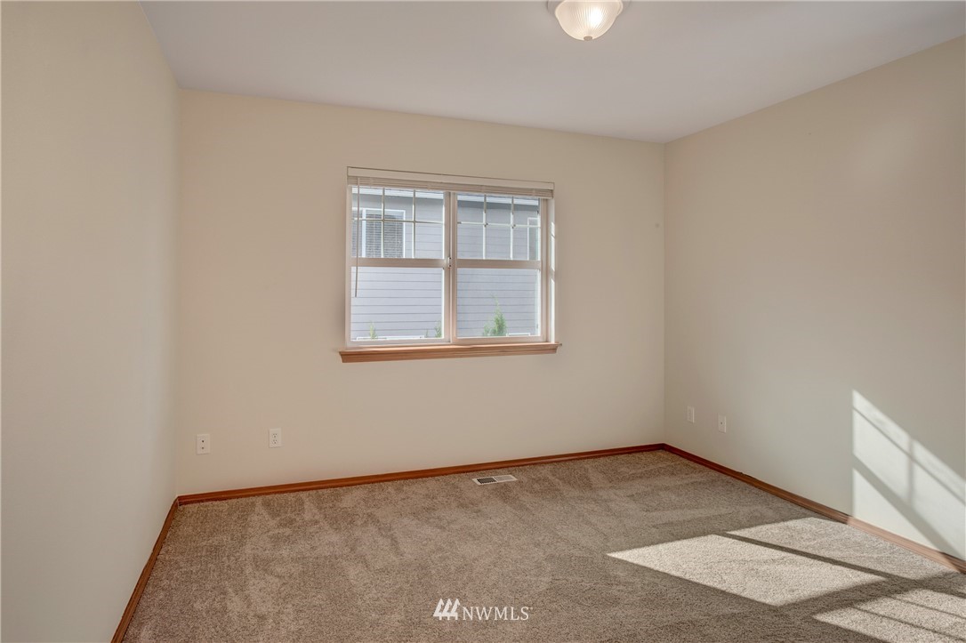 6709 Southeast 2nd Place Renton, WA 98059 - Photo 23 of 25 an empty room with a window
