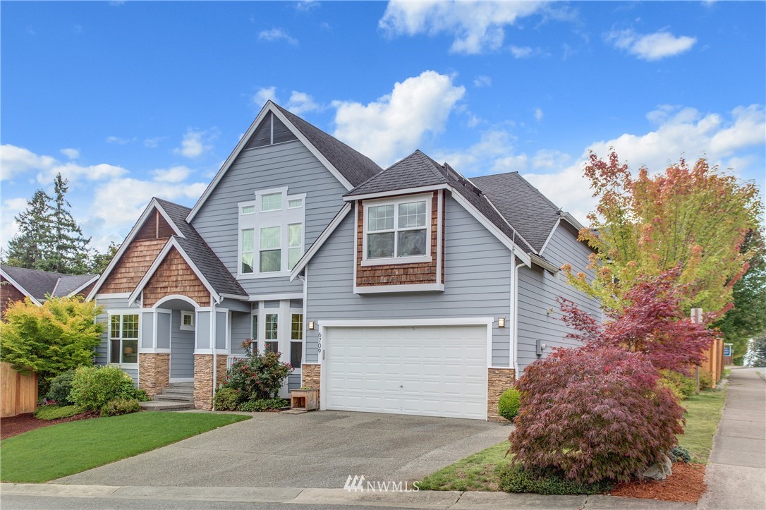 6709 Southeast 2nd Place Renton, WA 98059 - Photo 25 of 25 a front view of a house with garden