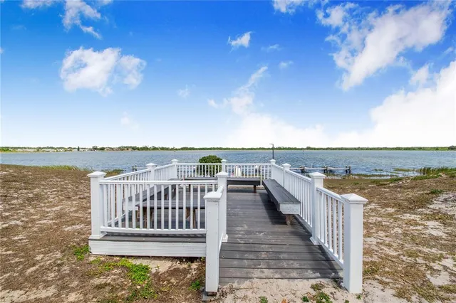 a view of roof deck with ocean view