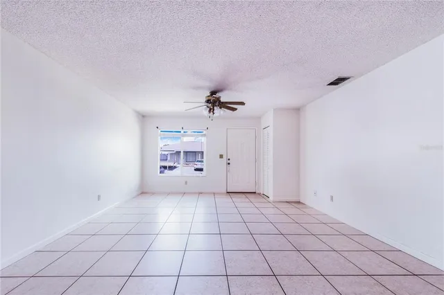 a view of a livingroom and a window