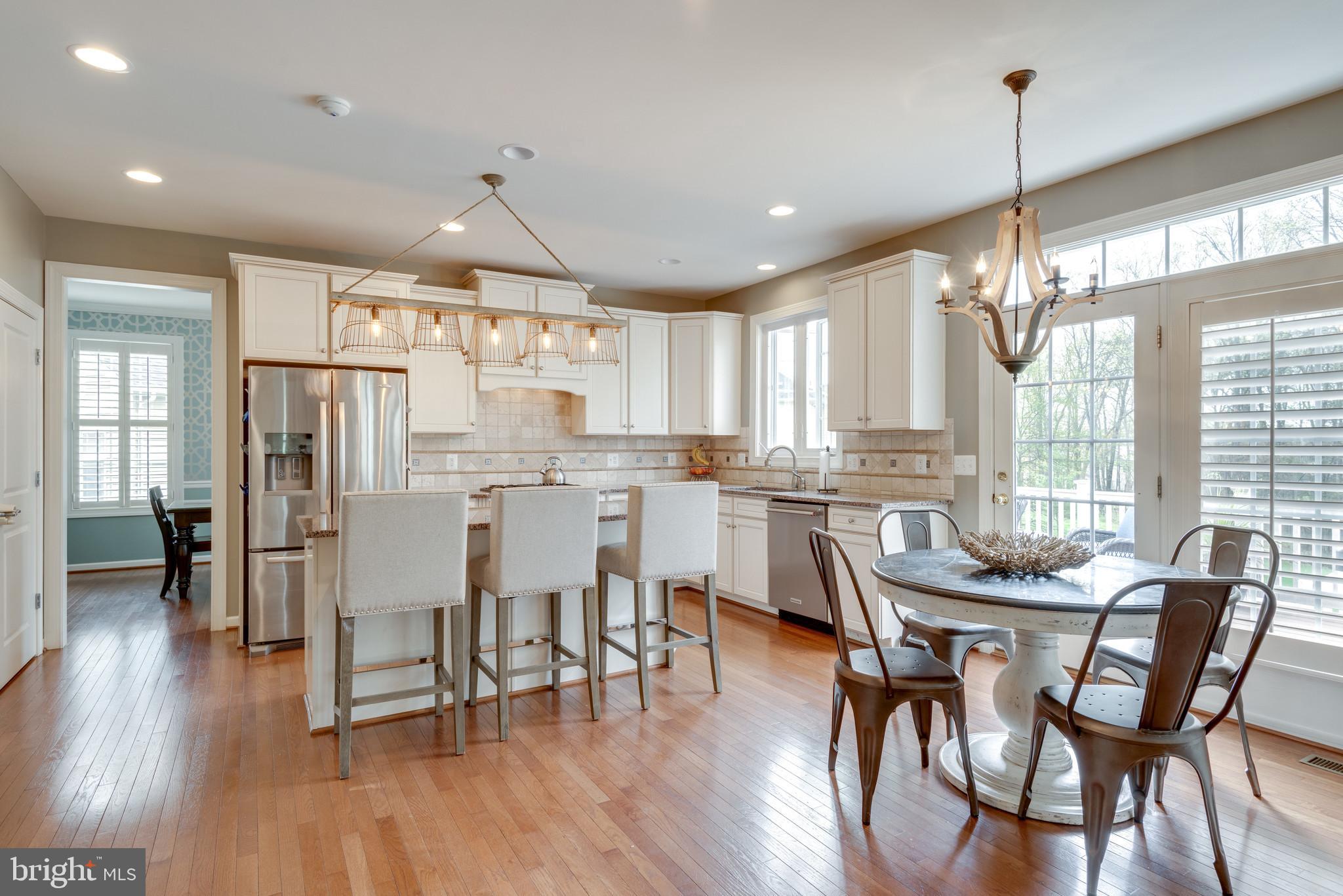 42317 Rising Moon Place Brambleton, VA 20148 - Photo 8 of 52 Beautiful gourmet kitchen with breakfast area