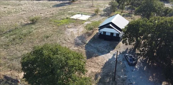 a view of house with yard