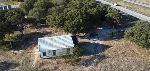 a view of backyard with green space