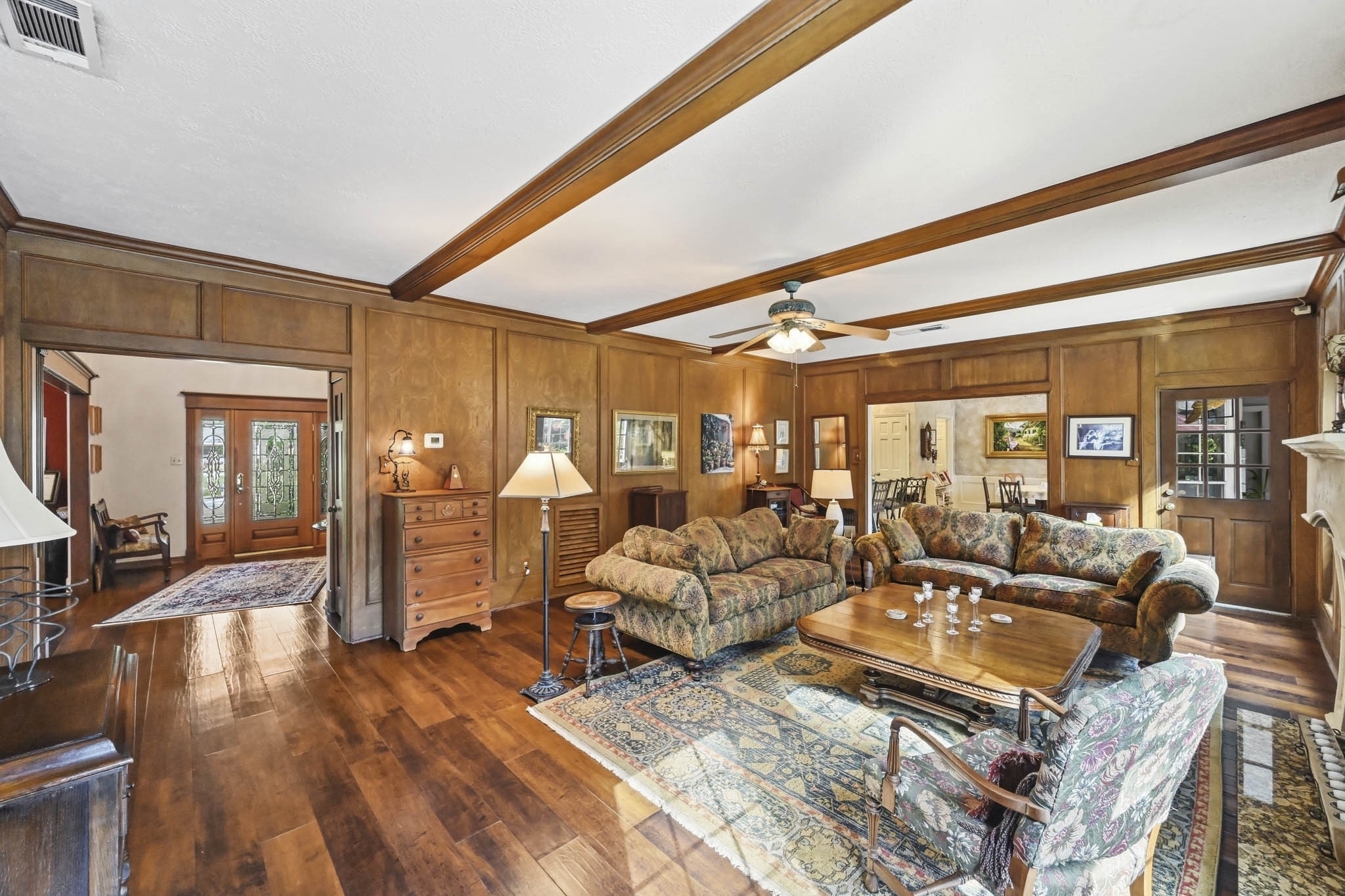 16030 Rudgewick Lane Spring, TX 77379 - Photo 13 of 50 This photo shows the layout of the family room, foyer to the left, doorway to the kitchen to the right.