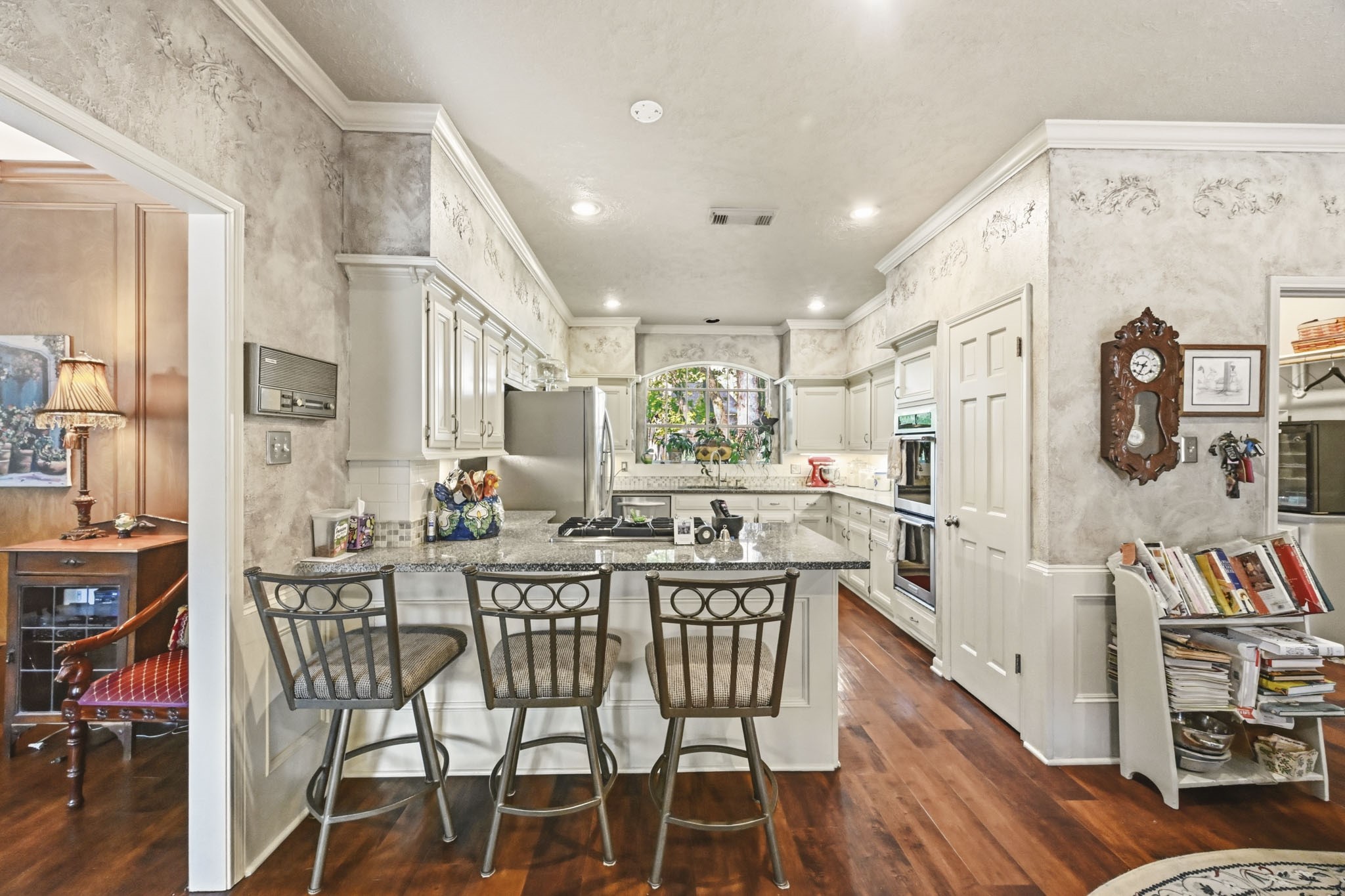 16030 Rudgewick Lane Spring, TX 77379 - Photo 15 of 50 It's enjoyable to sit at the breakfast bar and have fun conversations over coffee in the morning or a glass of wine in the evening.