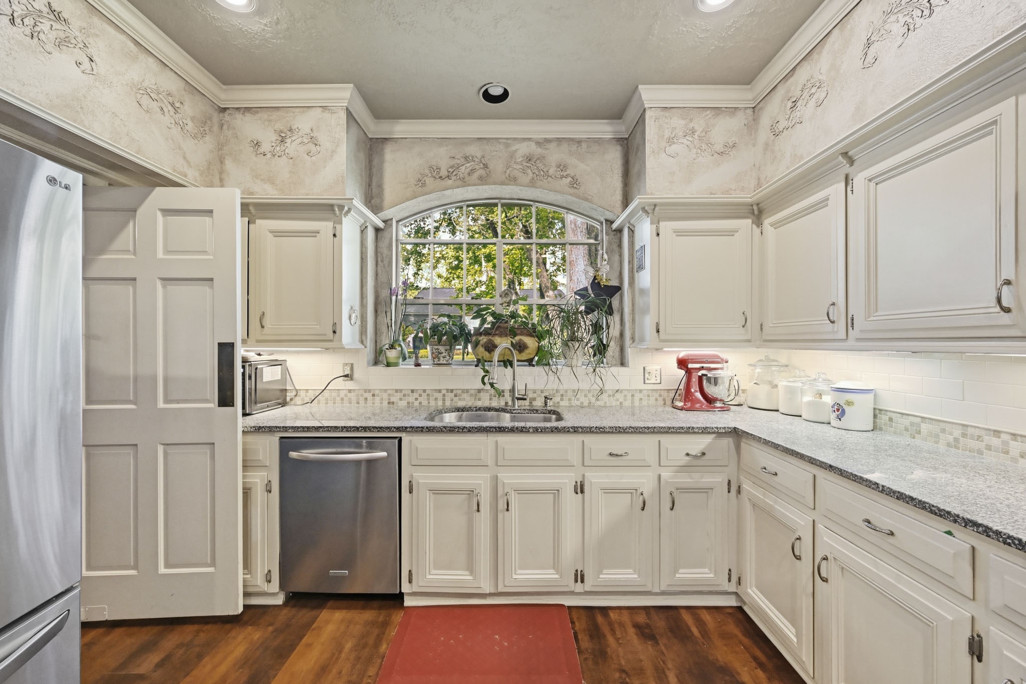 16030 Rudgewick Lane Spring, TX 77379 - Photo 17 of 50 When the counters were installed, a large sink was added with fixtures. Enjoy views of the front yard from the sink.