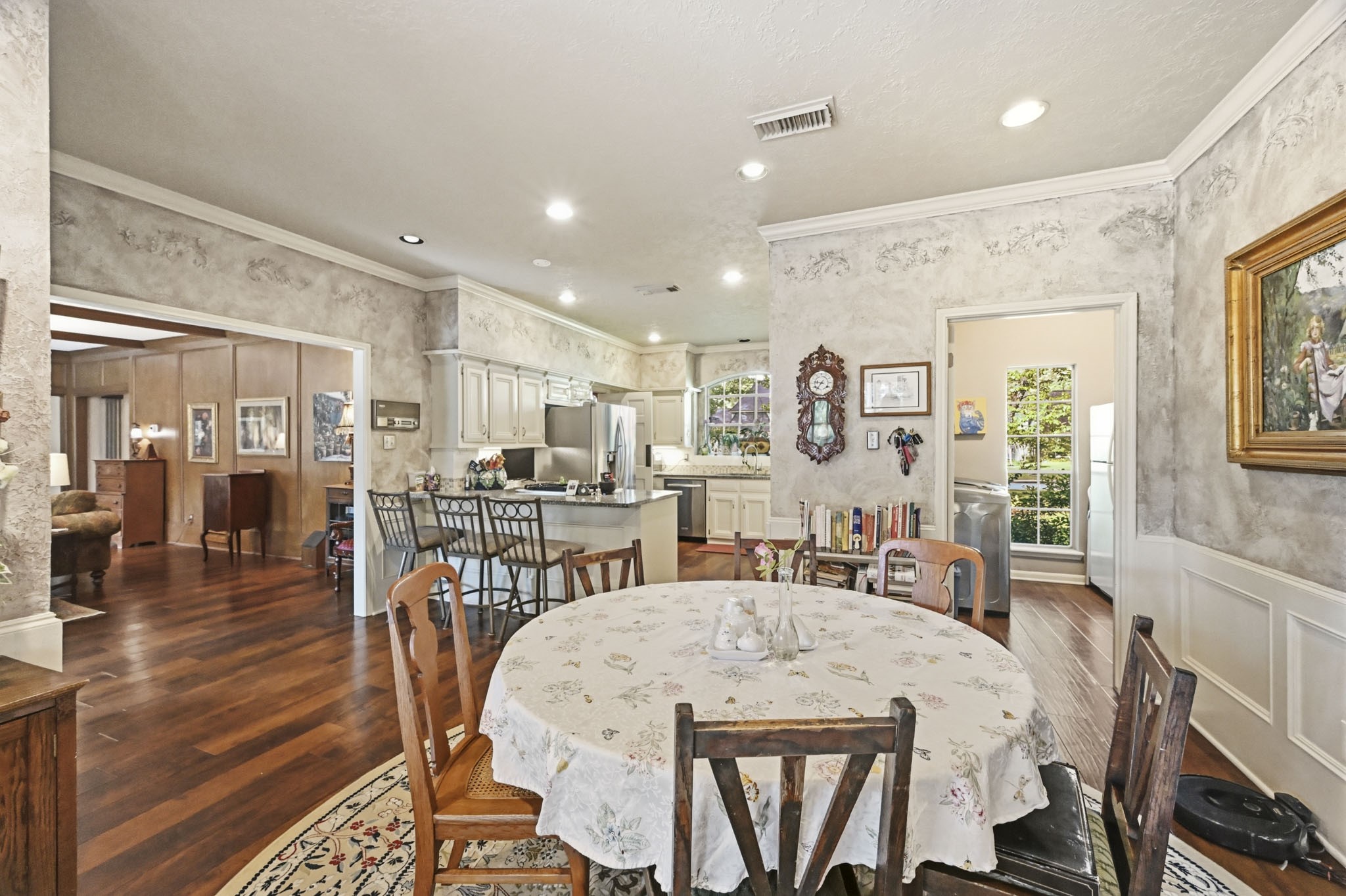 16030 Rudgewick Lane Spring, TX 77379 - Photo 3 of 50 The kitchen is the heart of this home with a large breakfast area, counter seating, open to the family room and
French doors to the backyard, just behind the table.