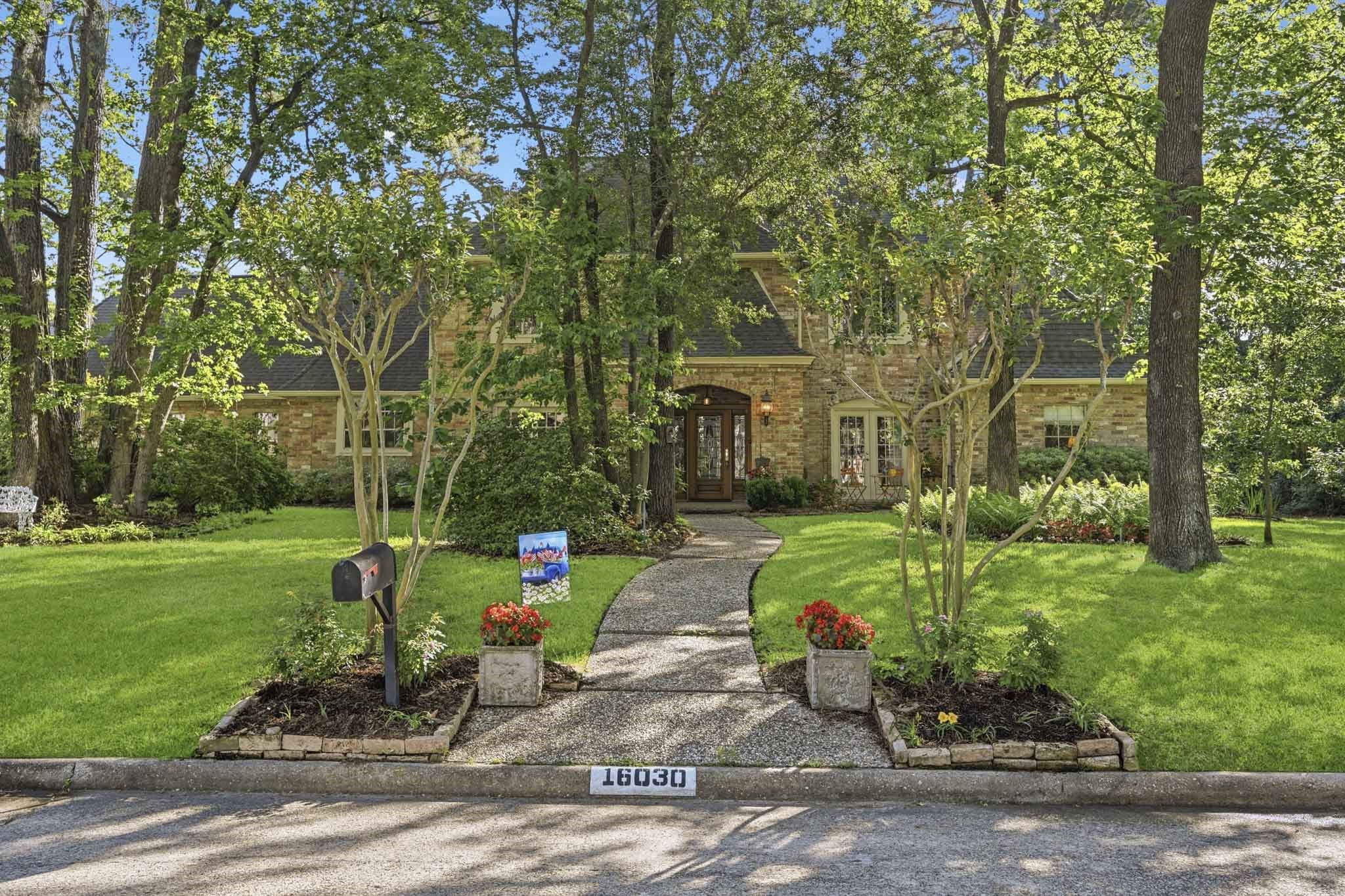 16030 Rudgewick Lane Spring, TX 77379 - Photo 5 of 50 The old foundation plantings were totally removed and replaced with fresh shrubs and bushes 3 years ago. Added foundation lighting makes a stunning night view.