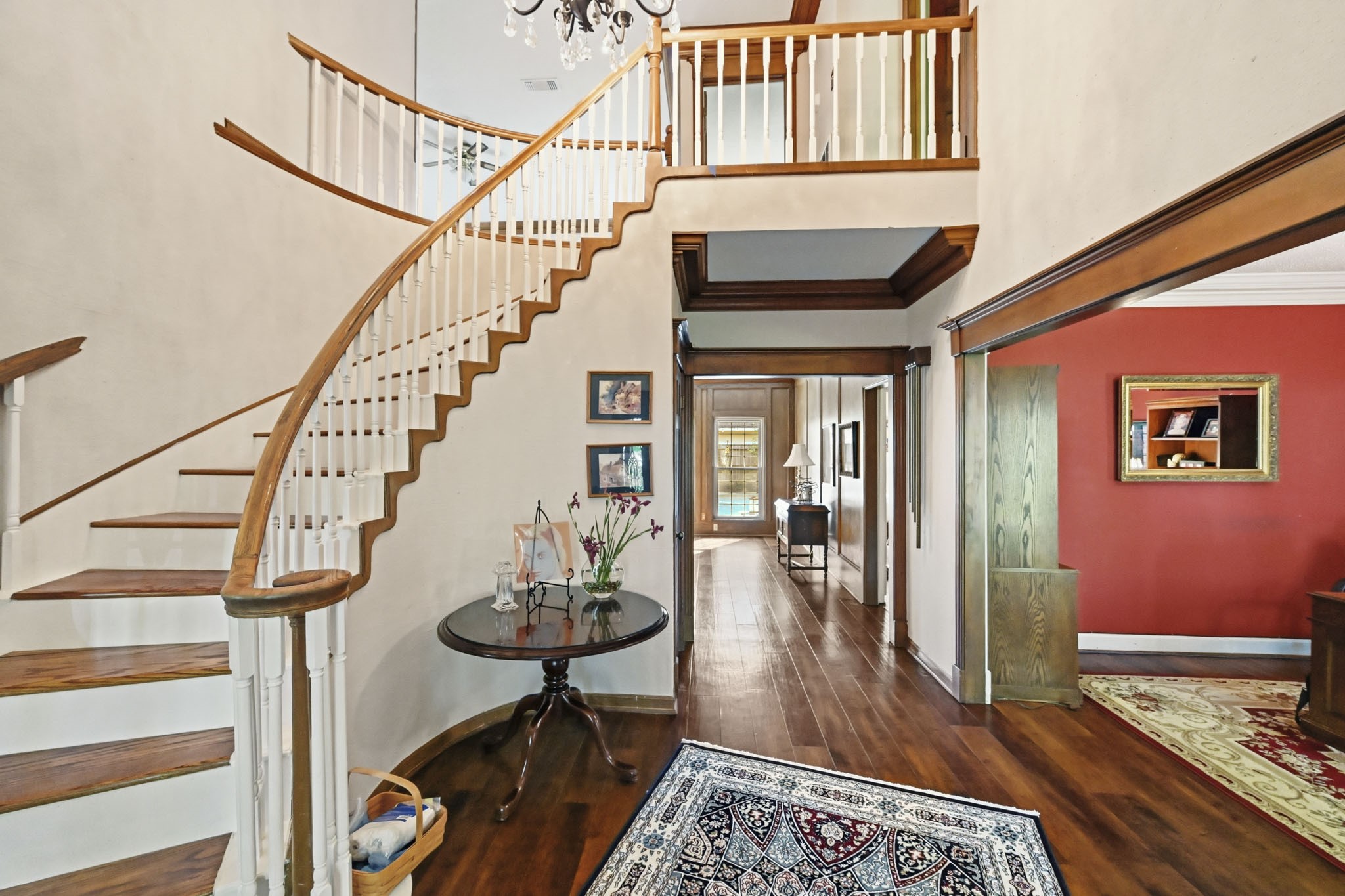 16030 Rudgewick Lane Spring, TX 77379 - Photo 7 of 50 A two story foyer is a grand entrance to the home. Oak stairs were installed 2 years ago,, the chandelier 3 years ago.