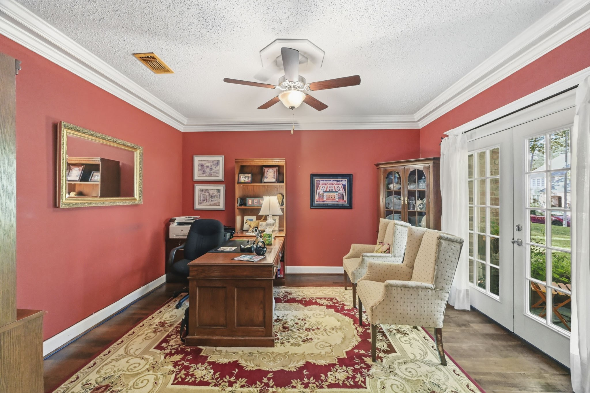16030 Rudgewick Lane Spring, TX 77379 - Photo 9 of 50 This room was intended to be a formal living room, but is used as a second office. So nice to sit at your desk and look at the lush front yard and cute sitting area. The fan was installed in March of 2026.