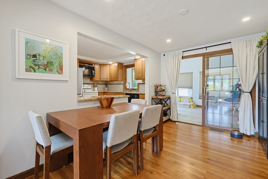 19 Weir Road Waltham, MA 02451 - Photo 9 of 41 a view of a dining room with furniture window and wooden floor
