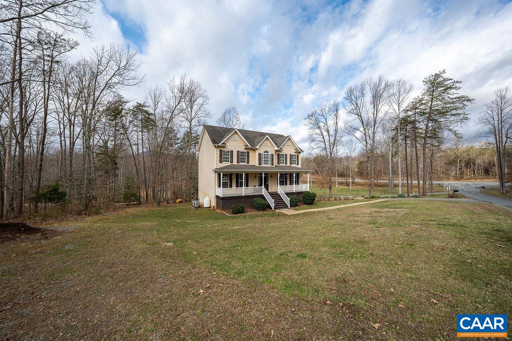 60 Pine Ridge Road Faber, VA 22938 - Photo 11 of 74 a view of a big house with a big yard and large trees