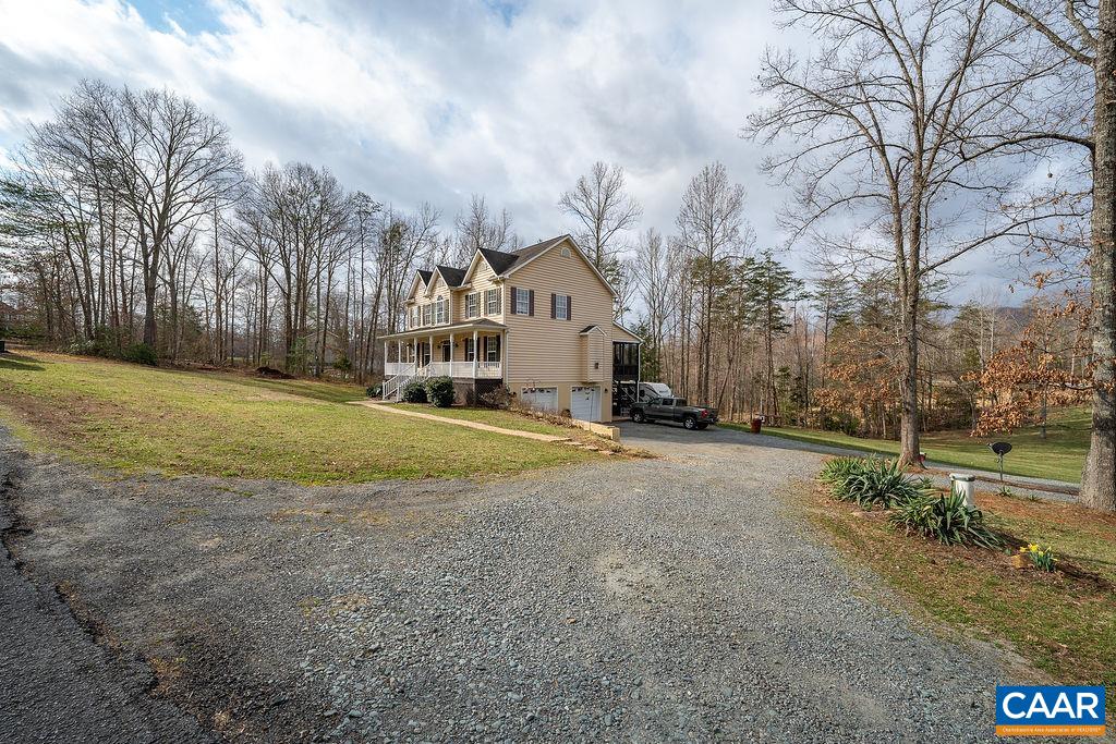 60 Pine Ridge Road Faber, VA 22938 - Photo 12 of 74 a view of large house with a big yard and large trees