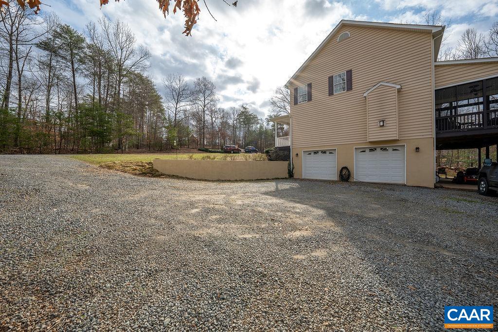 60 Pine Ridge Road Faber, VA 22938 - Photo 15 of 74 a view of a house with backyard and trees