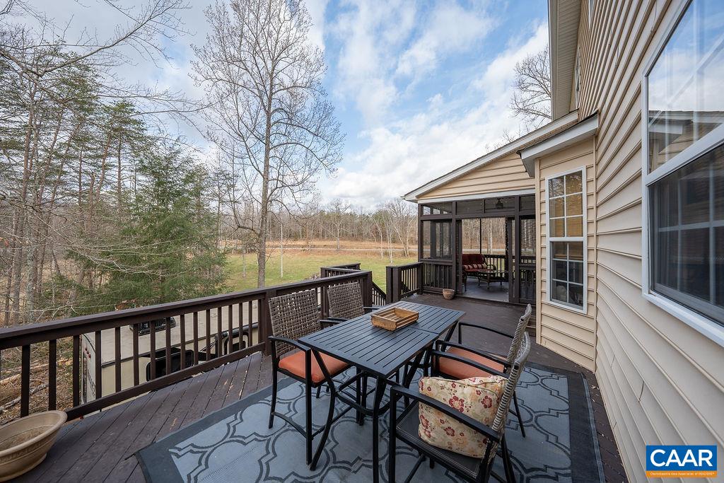 60 Pine Ridge Road Faber, VA 22938 - Photo 21 of 74 a view of a chairs and table on the balcony