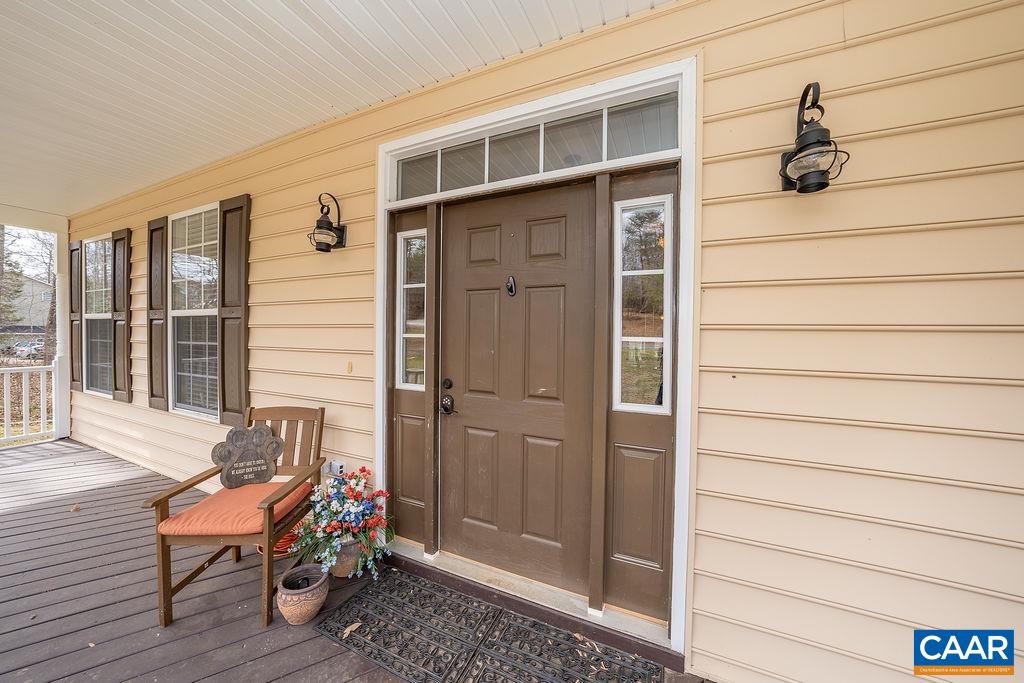 60 Pine Ridge Road Faber, VA 22938 - Photo 5 of 74 a view of a room with a door and wooden bench