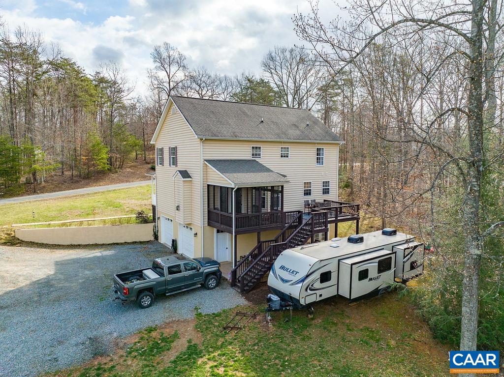 60 Pine Ridge Road Faber, VA 22938 - Photo 59 of 74 a view of a house with backyard and sitting area