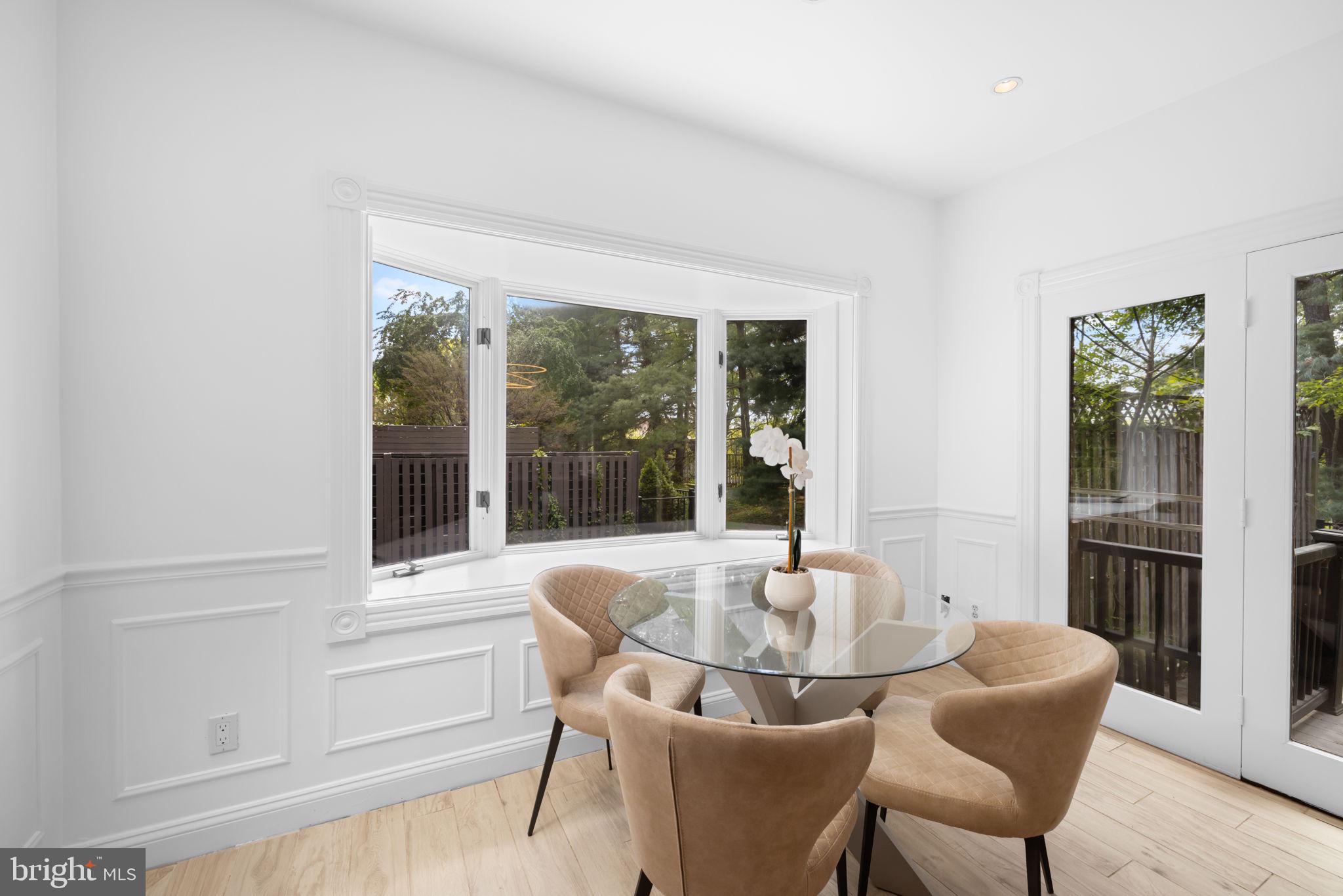4018 Chancery Court Northwest Washington, DC 20007 - Photo 18 of 43 a dining room with furniture and large windows