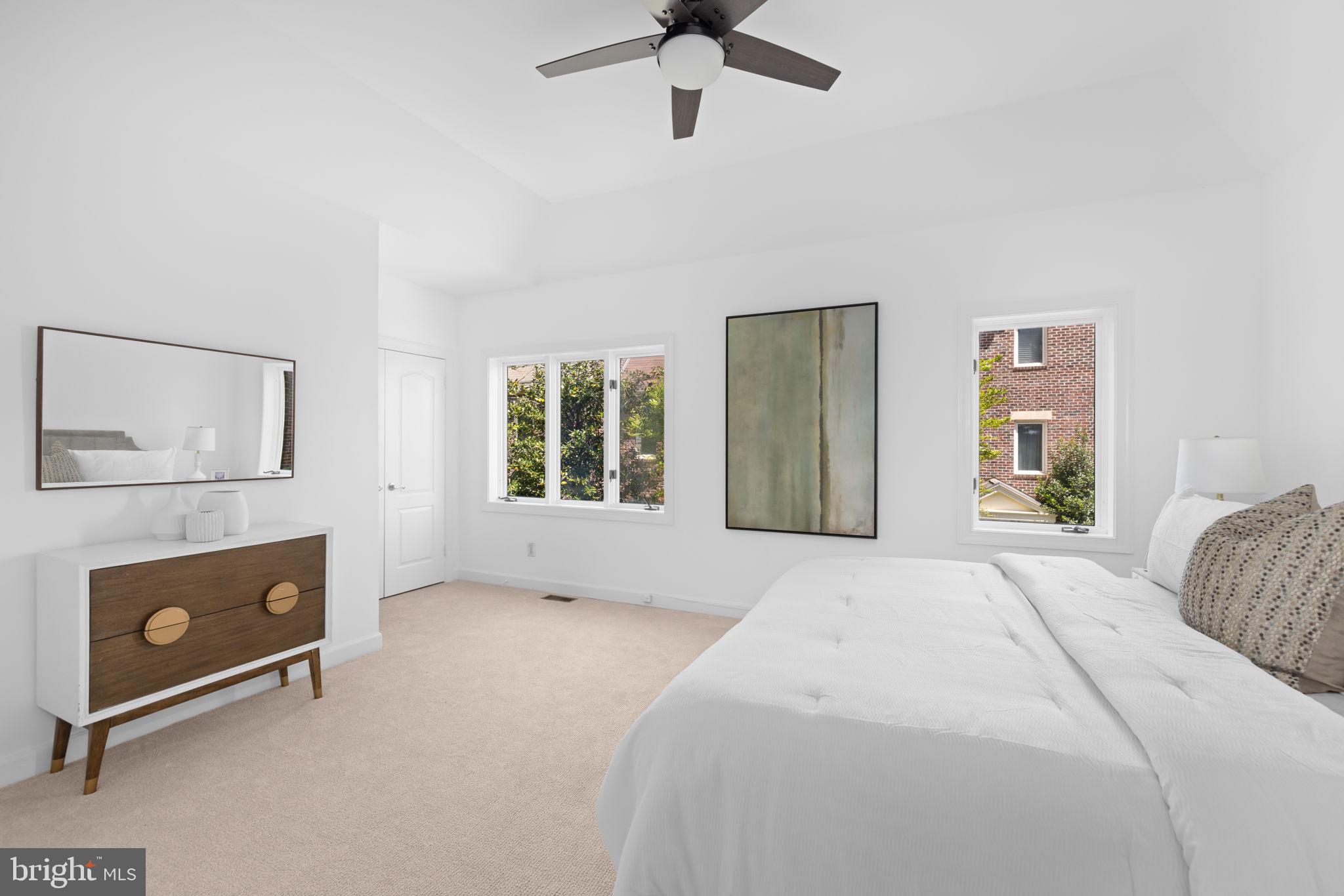 4018 Chancery Court Northwest Washington, DC 20007 - Photo 20 of 43 a spacious bedroom with a bed and a window