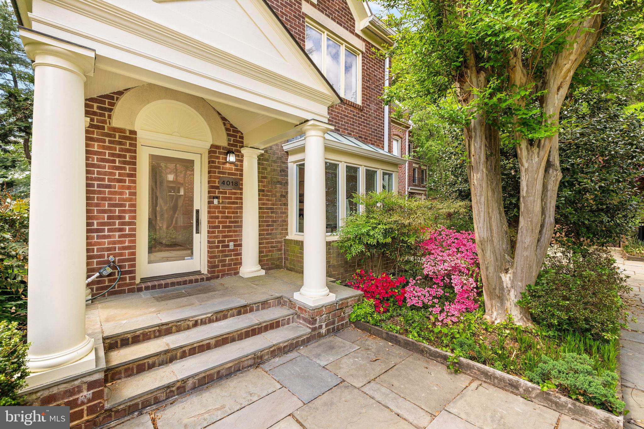4018 Chancery Court Northwest Washington, DC 20007 - Photo 2 of 43 a front view of a house with a porch