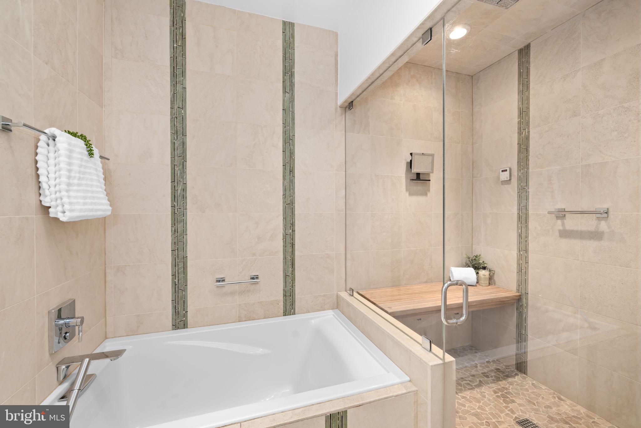 4018 Chancery Court Northwest Washington, DC 20007 - Photo 28 of 43 a bathroom with a bathtub and a shower