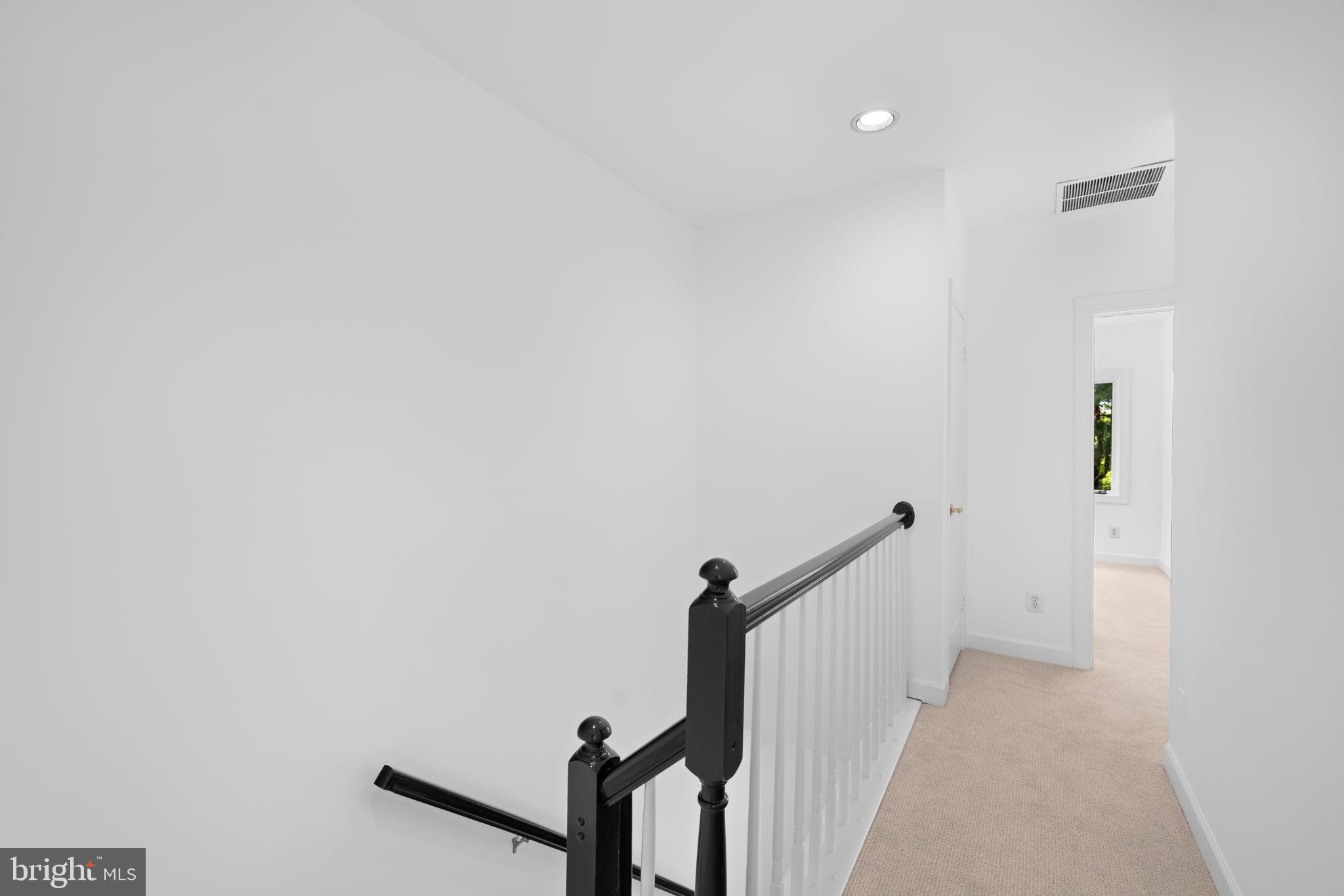 4018 Chancery Court Northwest Washington, DC 20007 - Photo 30 of 43 a view of a hallway with a white walls