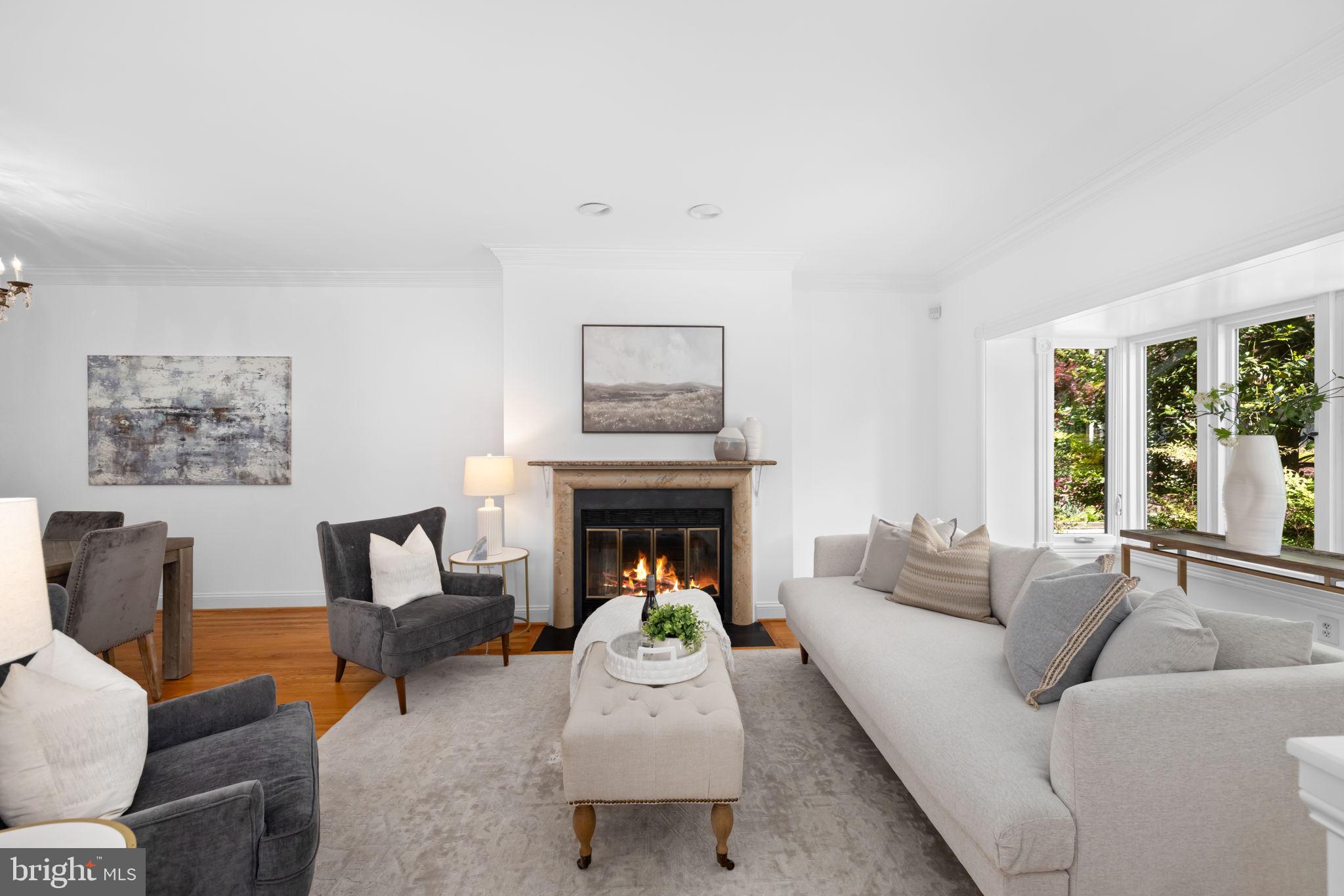 4018 Chancery Court Northwest Washington, DC 20007 - Photo 5 of 43 a living room with furniture and a fireplace