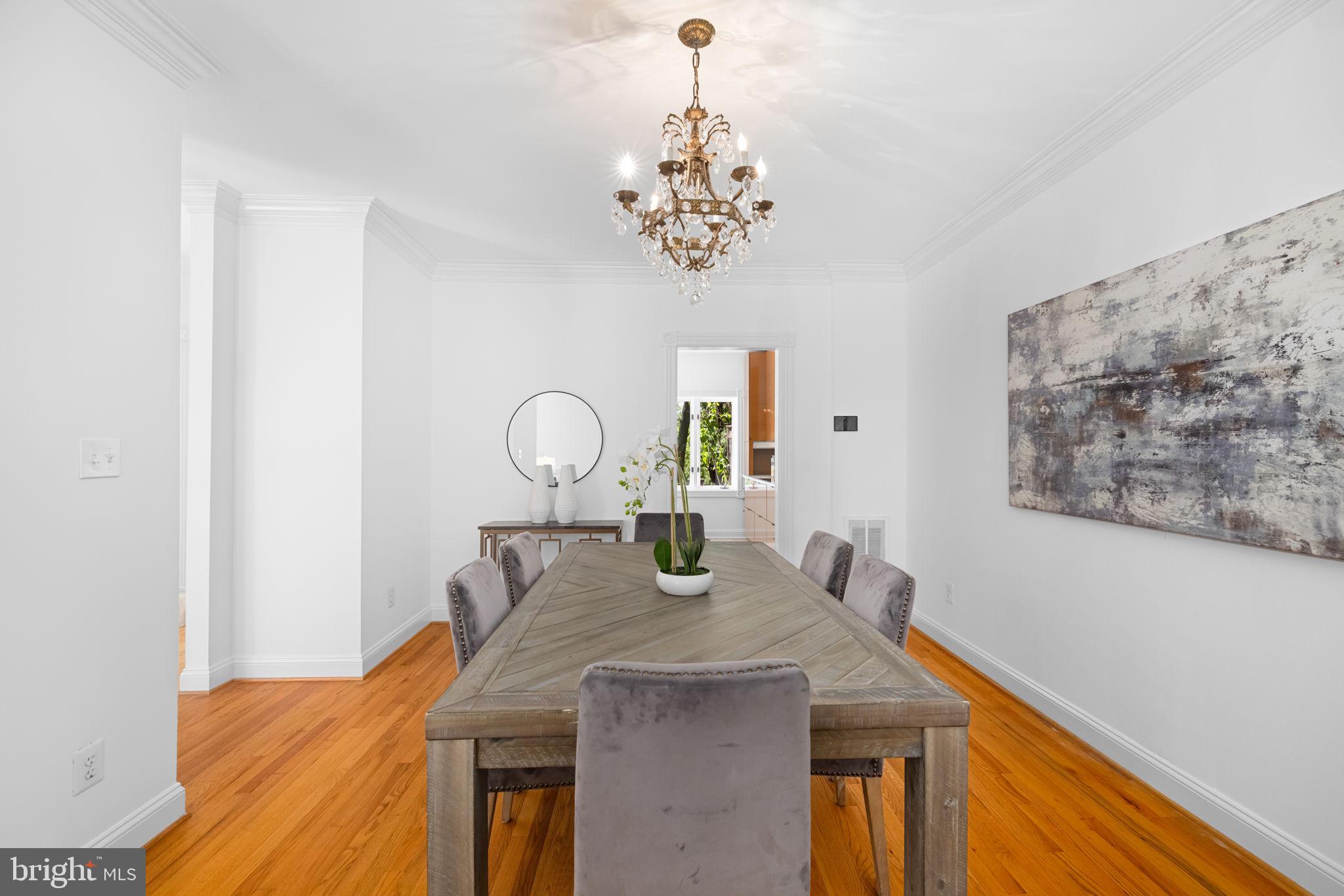 4018 Chancery Court Northwest Washington, DC 20007 - Photo 9 of 43 a view of a dining room with furniture and chandelier