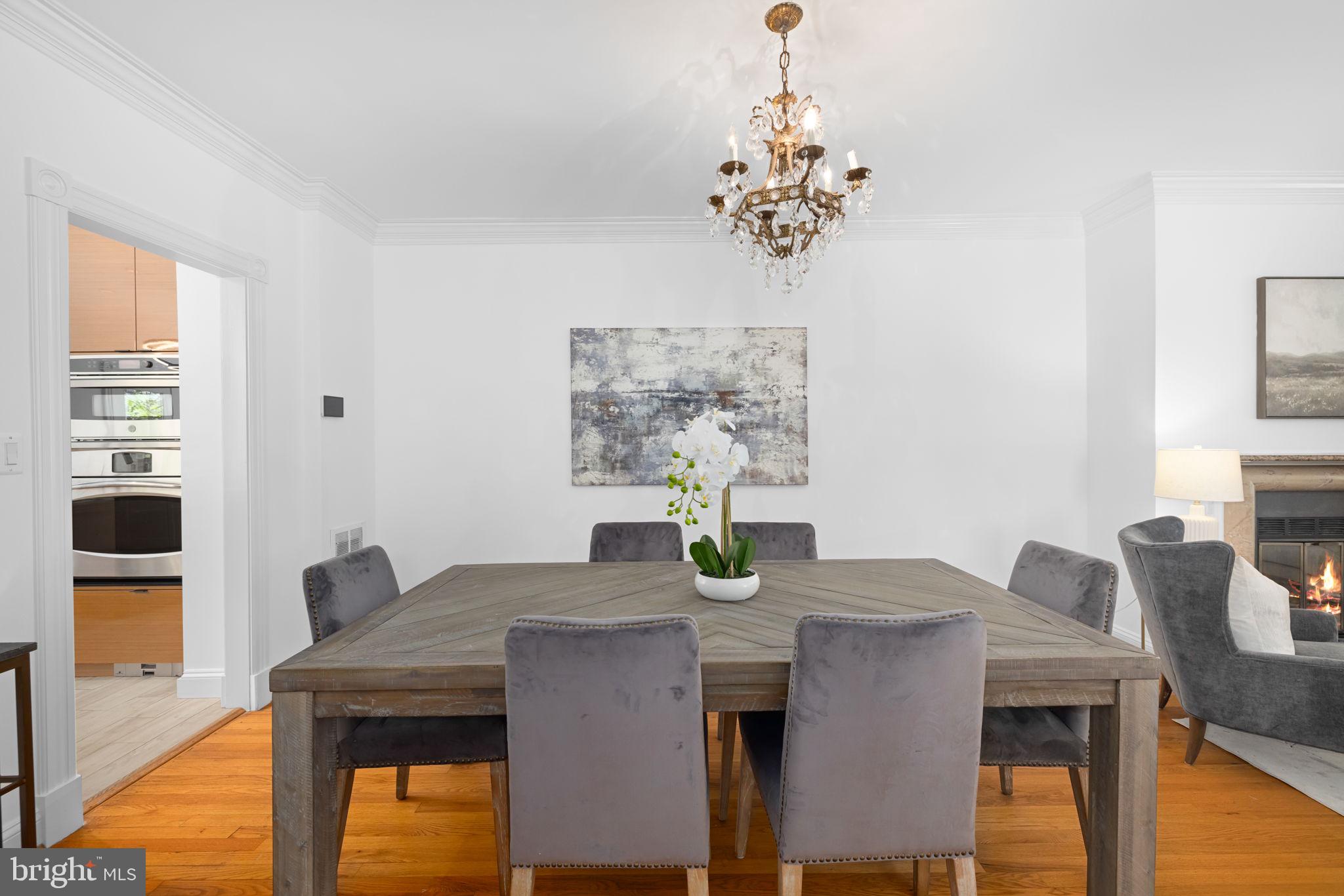 4018 Chancery Court Northwest Washington, DC 20007 - Photo 10 of 43 a view of a dining room with furniture and wooden floor