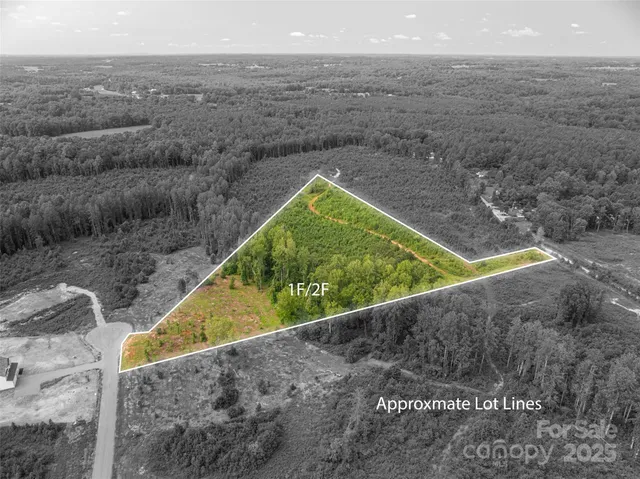 a view of a pool with a yard