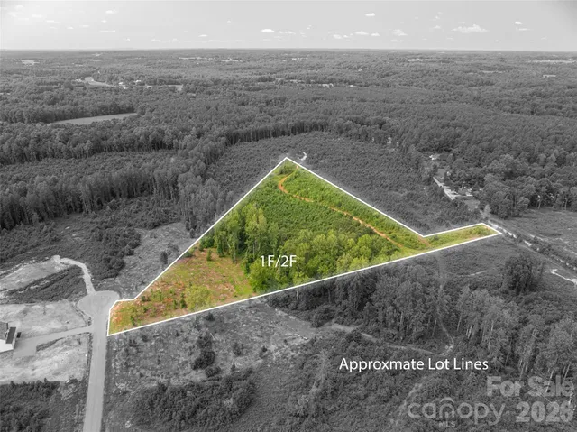 a view of a pool with a yard