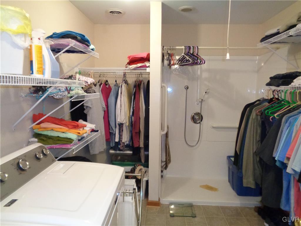 2291 Heffner Road Fogelsville, PA 18051 - Photo 28 of 50 First floor laundry with walk-in shower.