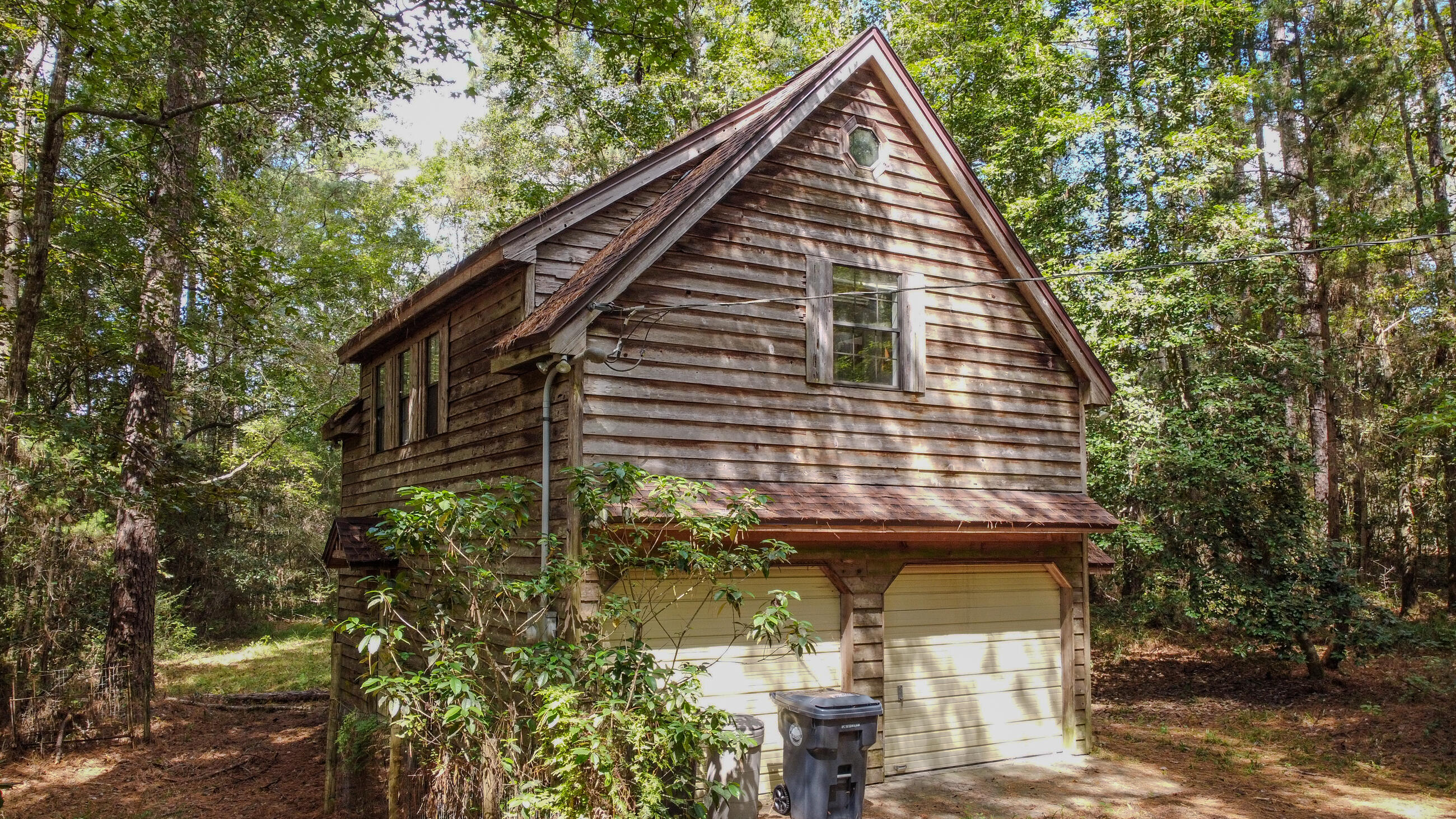 402 Miles Martin Road DeFuniak Springs, FL 32435 - Photo 18 of 31 a view of a house with large windows