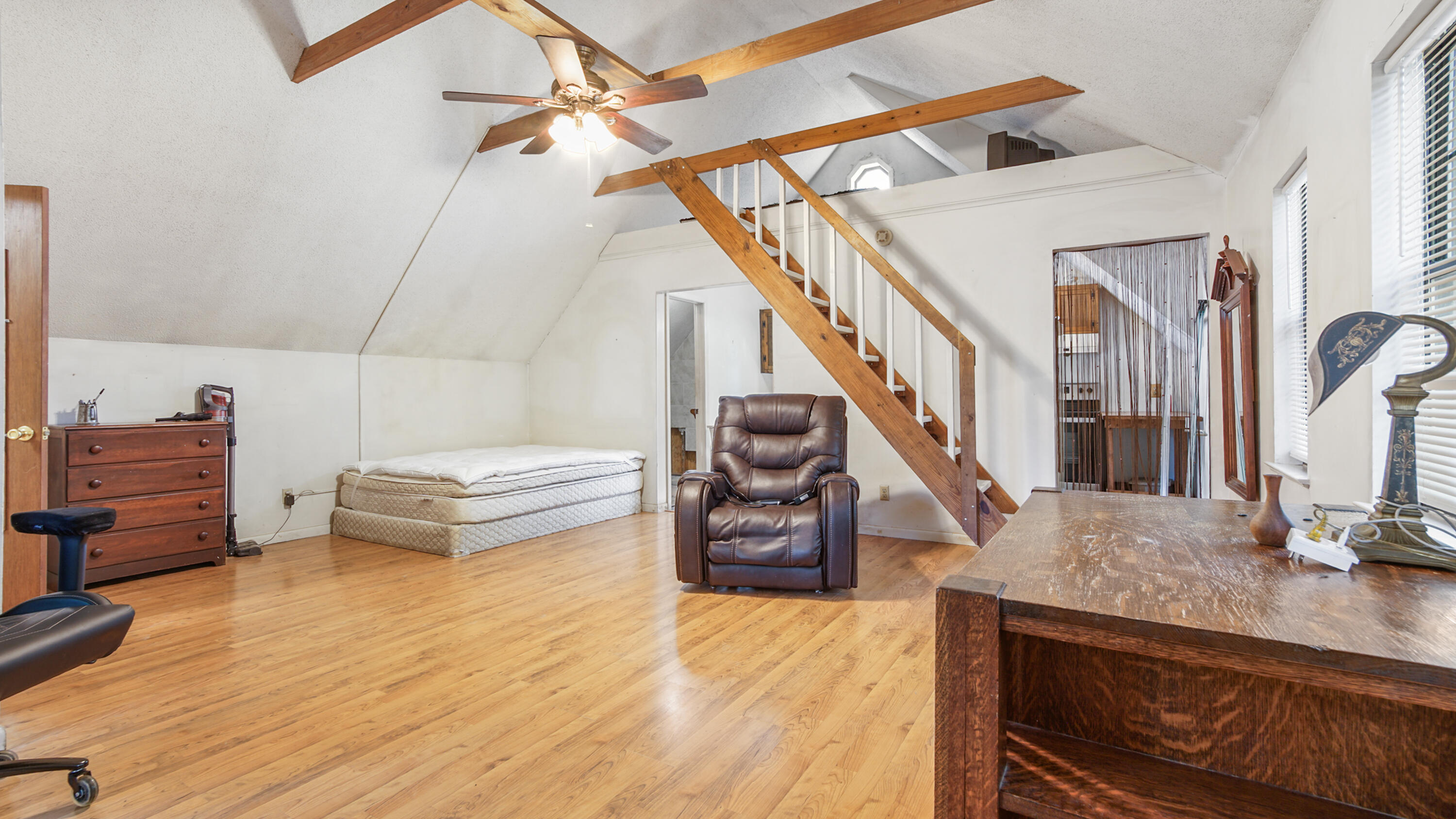 402 Miles Martin Road DeFuniak Springs, FL 32435 - Photo 5 of 31 a living room with furniture and stairs