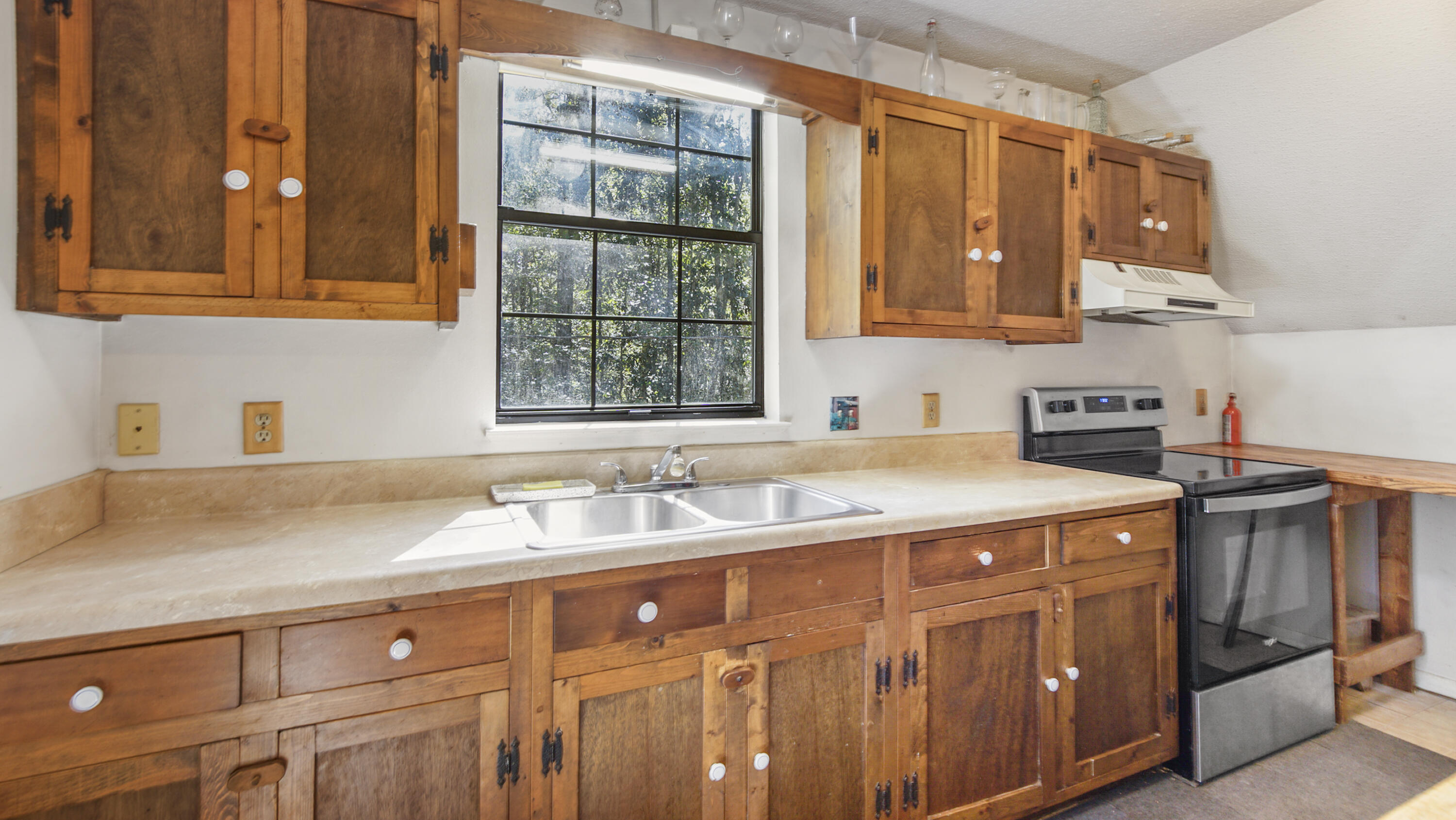 402 Miles Martin Road DeFuniak Springs, FL 32435 - Photo 10 of 31 a kitchen with a sink and cabinets