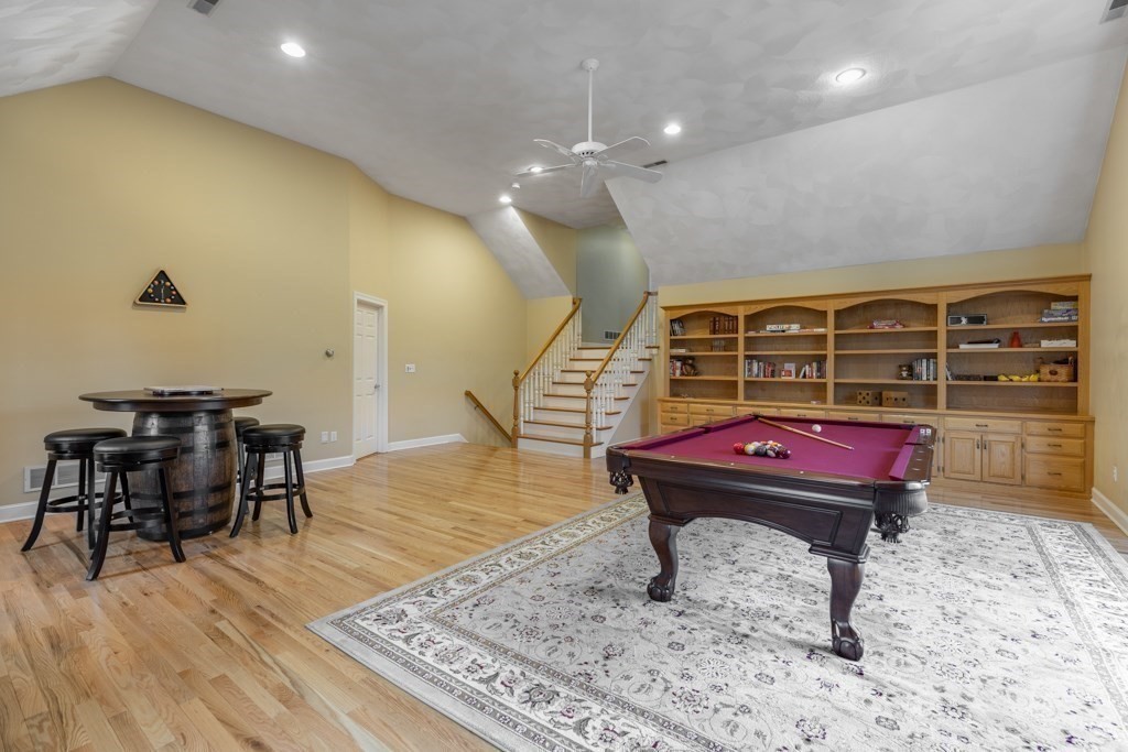 4 Walker Lane Boxford, MA 01921 - Photo 24 of 40 a room with lots of furniture and wooden floor