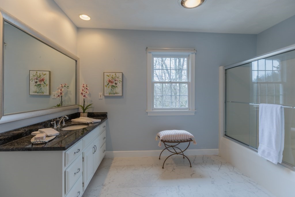 4 Walker Lane Boxford, MA 01921 - Photo 32 of 40 a bathroom with a granite countertop sink and a mirror