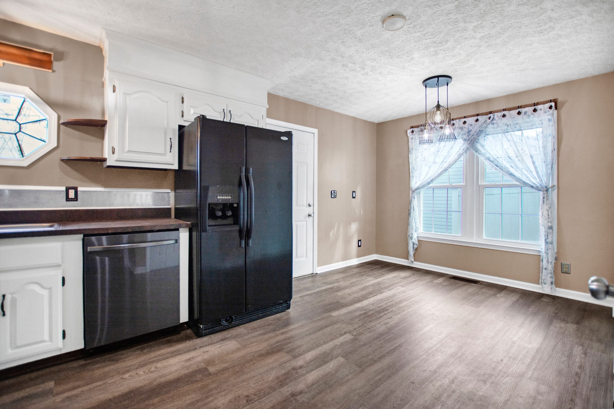 128 South Richview Road Clarksville, TN 37043 - Photo 8 of 19 a kitchen with stainless steel appliances granite countertop a refrigerator and a sink