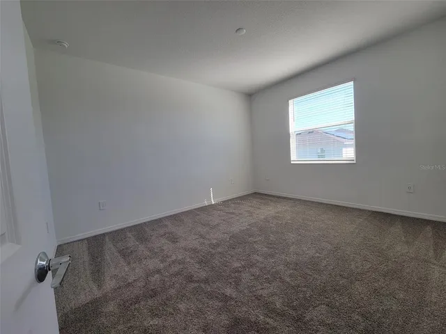 wooden floor and closet in a room