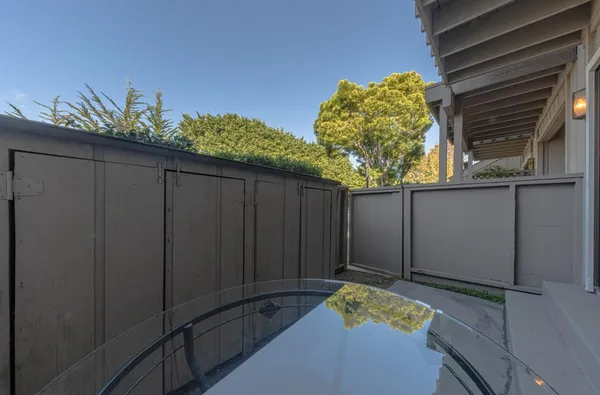 a view of a backyard of the house