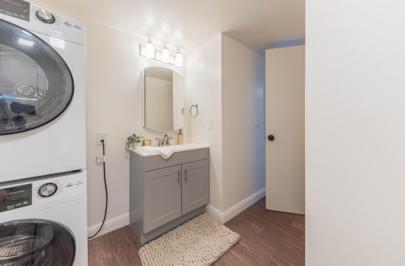 3850 Rio Road, Unit 24 Carmel, CA 93923 - Photo 18 of 39 a bathroom with a sink and a mirror