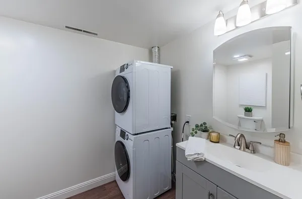 a bathroom with a sink and mirror