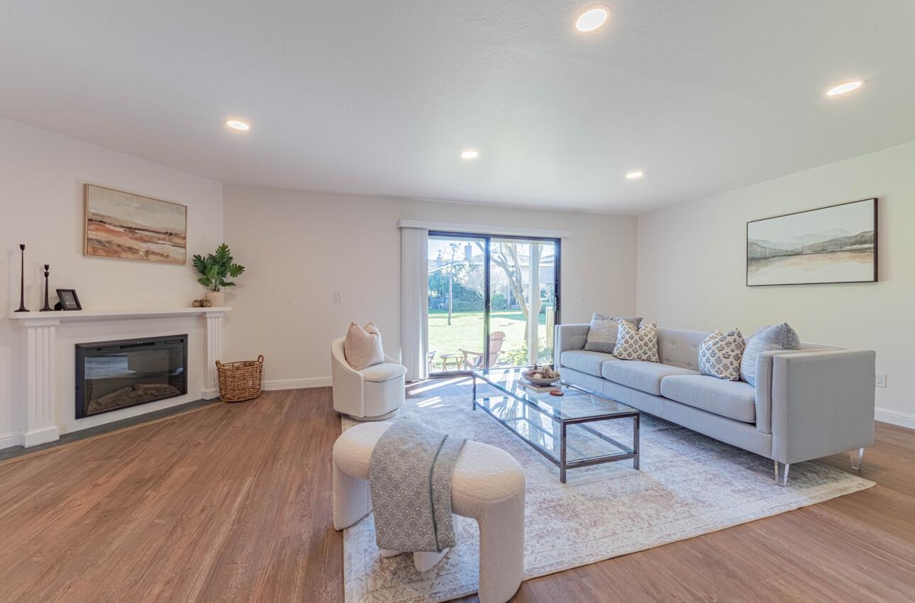 3850 Rio Road, Unit 24 Carmel, CA 93923 - Photo 3 of 39 a living room with furniture and a fireplace