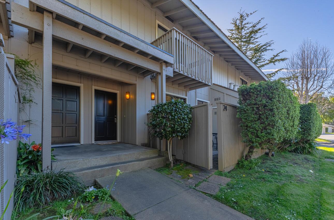3850 Rio Road, Unit 24 Carmel, CA 93923 - Photo 4 of 39 a front view of a house with garden