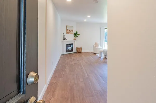 a view of livingroom with furniture and wooden floor