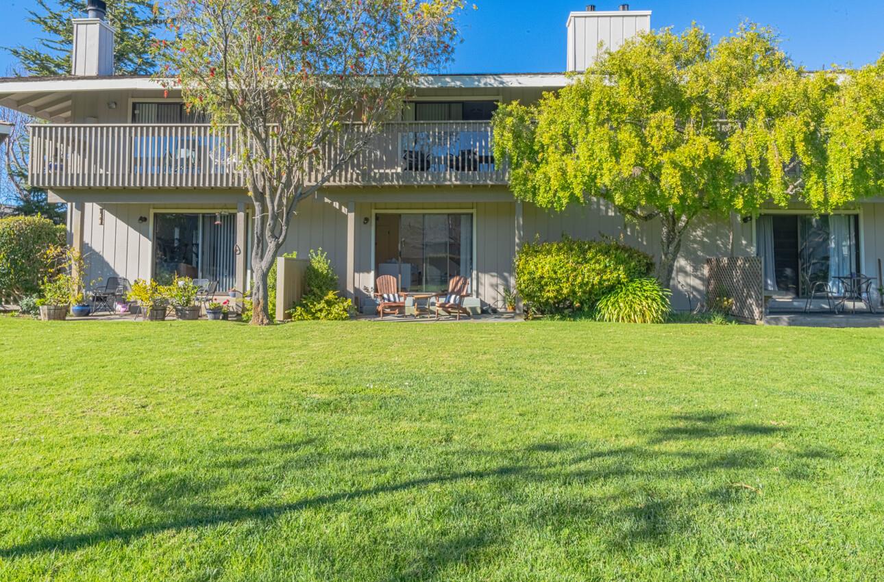 3850 Rio Road, Unit 24 Carmel, CA 93923 - Photo 10 of 39 a front view of a house with garden