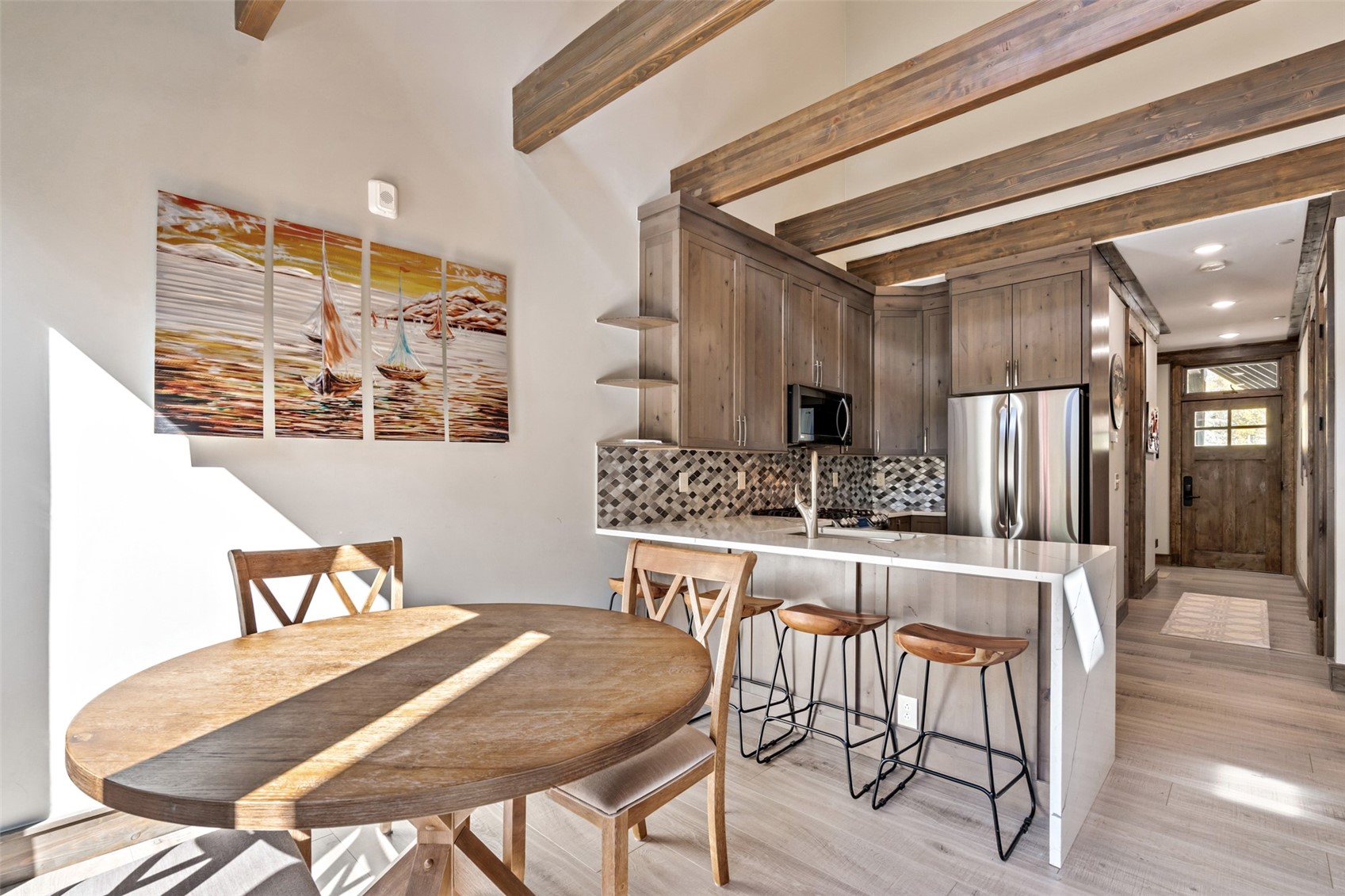 102 Lake Ridge Circle, Unit 1892 Keystone, CO 80435 - Photo 12 of 32 a view of a dining room with furniture