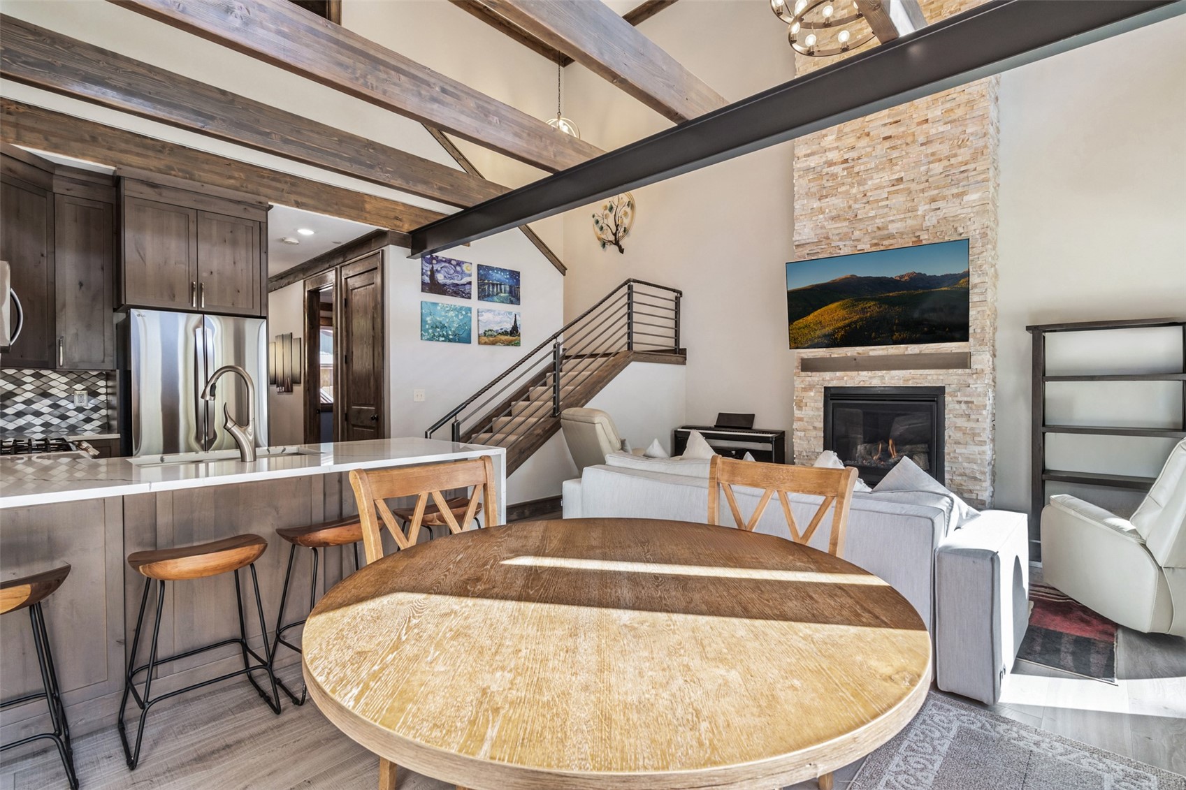 102 Lake Ridge Circle, Unit 1892 Keystone, CO 80435 - Photo 15 of 32 a view of a livingroom with furniture fire place and wooden floor