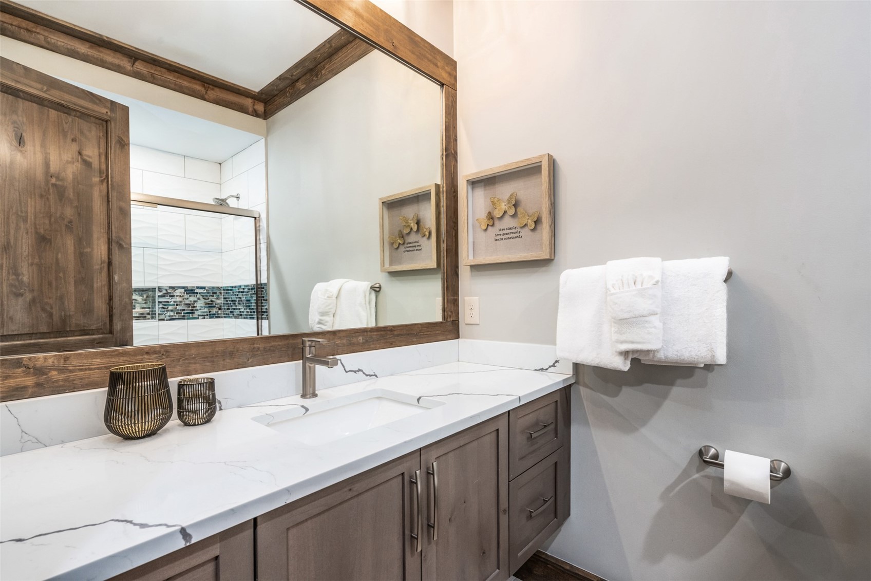 102 Lake Ridge Circle, Unit 1892 Keystone, CO 80435 - Photo 22 of 32 a bathroom with a sink and a mirror
